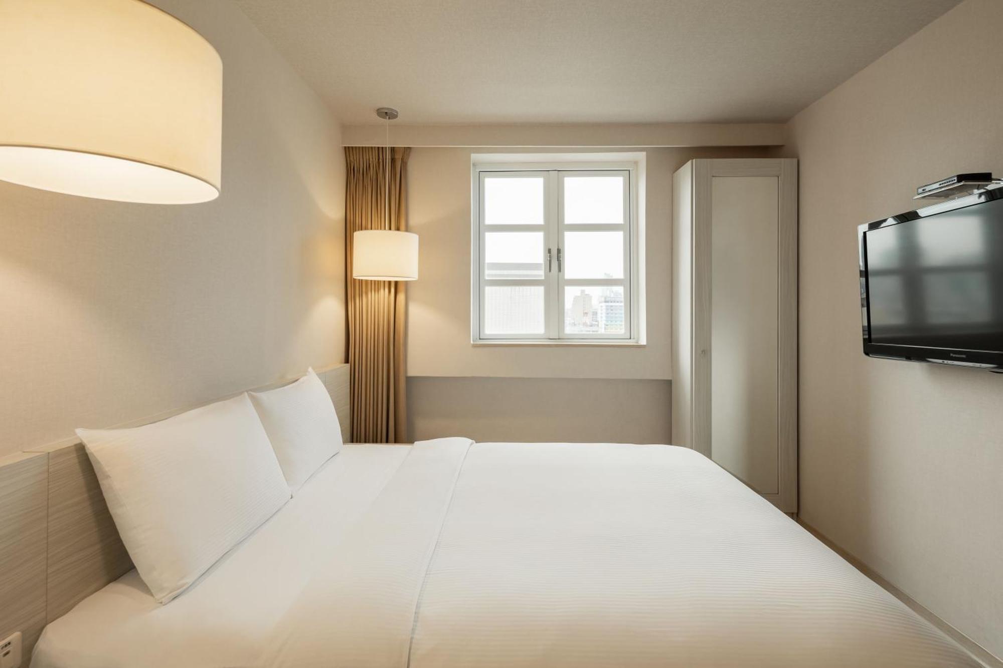 Kindness Hotel - Houyi Jiuru Kaohsiung Værelse billede